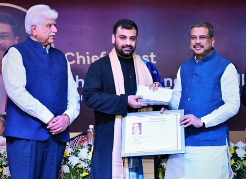 Union Minister Dharmendra Pradhan felicitates Anurag Chauhan